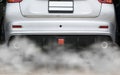 Smoke from a car producing pollution,smoke car pipe exhaust Royalty Free Stock Photo