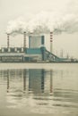 Smoke from chimney of power plant or station. Industry Royalty Free Stock Photo