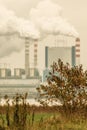 Smoke from chimney of power plant or station. Industry Royalty Free Stock Photo