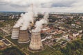 Smoke from chimneys of thermal power plant or station, aerial view from drone Royalty Free Stock Photo