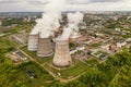 Smoke from chimneys of thermal power plant or station, aerial view from drone Royalty Free Stock Photo