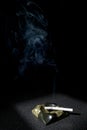 Smoke and cigarette in ashtray Royalty Free Stock Photo