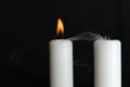 Burning and Blown Out Candle with Smoke Royalty Free Stock Photo