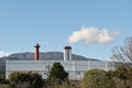 The smoke coming out of the chimney of a garbage incinerator. Royalty Free Stock Photo