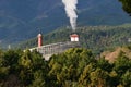 The smoke coming out of the chimney of a garbage incinerator. Royalty Free Stock Photo