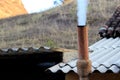 Smoke coming out of farmhouse chimney Royalty Free Stock Photo