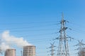 Smoke cooling tower pollution of the surrounding air environment of the atmosphere from the industrial plant and power lines high Royalty Free Stock Photo