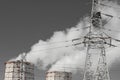 Smoke cooling tower pollution of the surrounding air gray sky environment of the atmosphere from the industrial plant and power Royalty Free Stock Photo