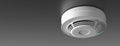 Smoke detector on ceiling. Fire safety equipment. 3d illustration