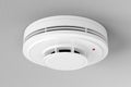 Smoke detector on ceiling Royalty Free Stock Photo