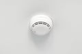Smoke detector or fire alarm sensor on the ceiling. Royalty Free Stock Photo