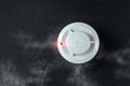 Smoke detector and fire detector on a black background.Fire Alarm flat lay Royalty Free Stock Photo