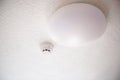 Smoke detector and fire protection system on ceiling Royalty Free Stock Photo