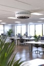 Smoke Detector Mounted on Office Ceiling Workplace Safety Concept Ensuring a Secure Environment Royalty Free Stock Photo