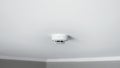 Smoke detector sensor on ceiling Royalty Free Stock Photo