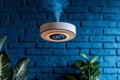 A smoke detector triggering an alert while the family is away, with the system automatically contacting emergency services and