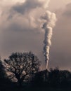 Smoke emission from chimney. Cause of global warming. Conception of air pollution and smog issue. Factory steam contaminate Royalty Free Stock Photo