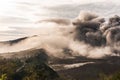 Smoke from the eruption of Bromo volcano above Bromo Tengger caldera Royalty Free Stock Photo