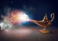 Smoke exists from magic aladdin genie lamp in a desert Royalty Free Stock Photo