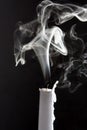 The smoke of an extinguished candle Royalty Free Stock Photo