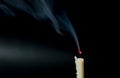 Smoke from extinguished candle. On Black background. Royalty Free Stock Photo