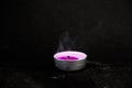 Smoke from an extinguished candle on  black background Royalty Free Stock Photo