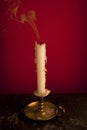 Smoke from an extinguished wax candle Royalty Free Stock Photo