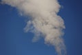 Smoke from a factory chimney releases air pollution and greenhouse gases Royalty Free Stock Photo