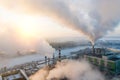 Smoke from factory chimneys on the background of sunrise Royalty Free Stock Photo