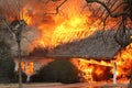 Smoke and Fire, A Homes Roof In Flames