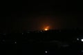 Smoke and flames rise after war planes belonging to the Israeli army carried out airstrikes over Gaza City Royalty Free Stock Photo