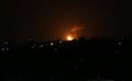 Smoke and flames rise after war planes belonging to the Israeli army carried out airstrikes over Gaza City Royalty Free Stock Photo