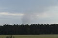 smoke forest fire in the distance during the scorching summer Royalty Free Stock Photo