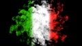 Smoke in green white and red color exploding in flag of Italy. Isolated on black background alpha channel. Royalty Free Stock Photo