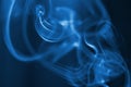 The smoke from the incense sticks. Abstract art. Soft focus. Color of the year 2020 Classic Blue. Royalty Free Stock Photo