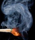 Smoke from a lighted match Royalty Free Stock Photo