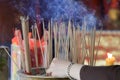 Smoke from many incense sticks that burning and embroidered in incense burner, Buddhists pray to be happy in the new year and ward Royalty Free Stock Photo