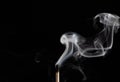 Smoke from a match that was just put out, isolated on black background Royalty Free Stock Photo