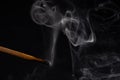 Smoke from a match that was just put out, isolated on black background Royalty Free Stock Photo