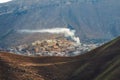 The smoke over a mountain village. The small village Choh which is placed on the high of Caucasus mountains