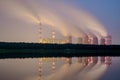 Smoke from the power plant chimneys at night. Royalty Free Stock Photo