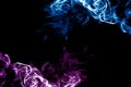 Smoke purple and blue on a dark background. Royalty Free Stock Photo