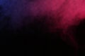 Artificial magic smoke in red-blue light on black background Royalty Free Stock Photo
