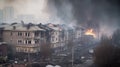 Smoke rise from burning bombed destroyed building