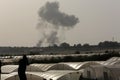 Smoke rises following an Israeli air strike in Khan Younis in the southern Gaza Strip