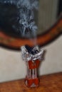 Smoke rising from the incense burner Royalty Free Stock Photo