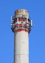 Smoke stack of the power station with antennas Royalty Free Stock Photo