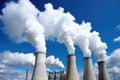 smoke stacks emitting fumes from a coal power plant Royalty Free Stock Photo