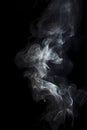 Smoke is steaming up against a black background, in the style of tenebrism Royalty Free Stock Photo