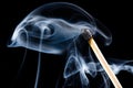 Smoke Swirling from Burnt Wooden Matchstick Royalty Free Stock Photo